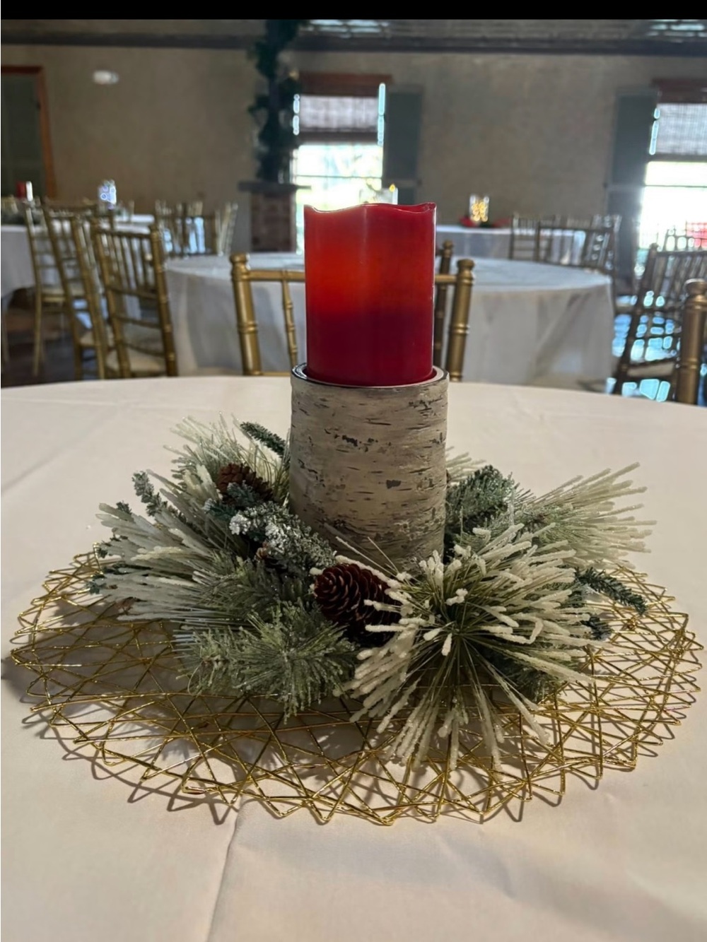 Festive Red Candle Centerpiece with Snow-Dusted Pine Wreath